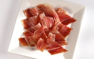 Slices of marbled Duroc ham