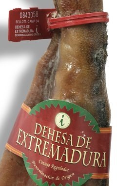 Red band and seal identifyng the Jamon de Bellota quality in the D.O. Dehesa de Extremadura